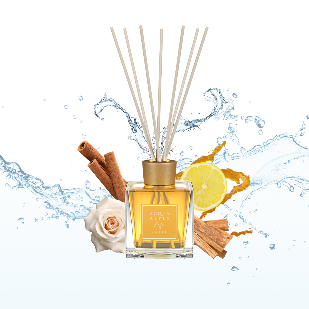 نفحات عطر الغرفة Amber: الليمون، الورد، القرفة، خشب الأرز، والعنبر